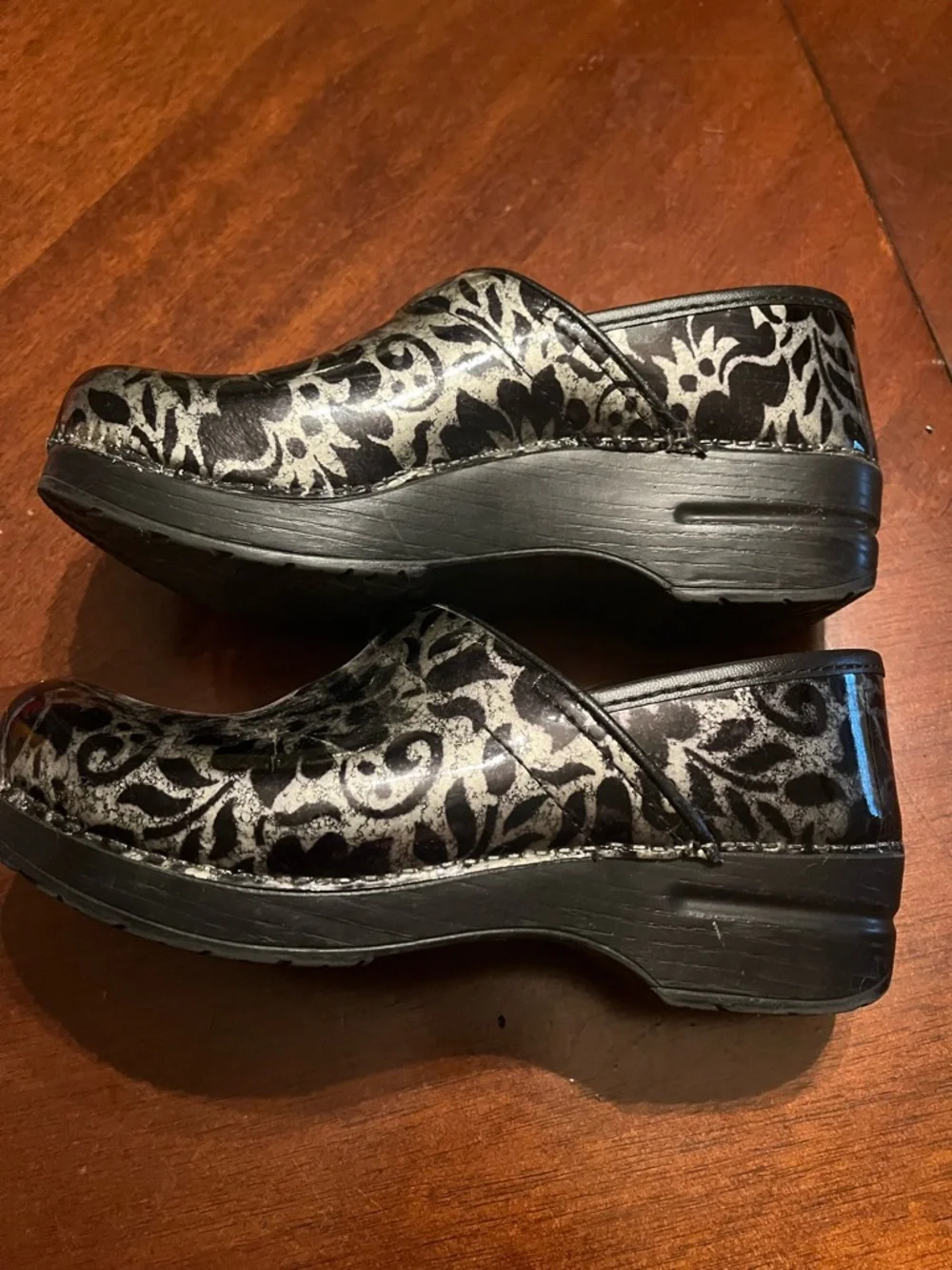 Dansko Black and Silver Floral Patent Clogs with Metallic Accents - Picture 3 of 7